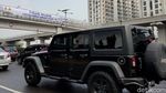 Spanduk Larangan Mudik Mejeng di JPO Gatot Subroto