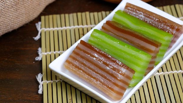 Kue lapis. Indonesian traditional cake with colorful layered soft rice flour pudding