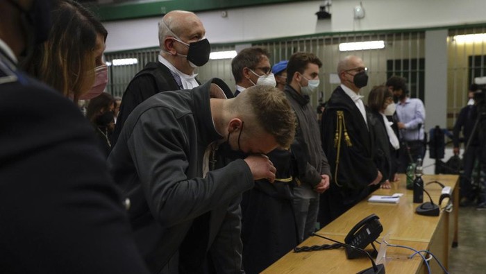 Finnegan Lee Elder listens as the verdict is read, in the trial for the slaying of an Italian plainclothes police officer in summer 2019, in Rome, Wednesday, May 5, 2021. A jury in Rome on Wednesday convicted two American friends in the 2019 slaying of a police officer in a drug sting gone awry, sentencing them to life in prison. The jury deliberated more than 12 hours before delivering the verdicts against Finnegan Lee Elder, 21, and Gabriel Natale Hjorth, 20, handing them Italys stiffest sentence. (AP Photo/Gregorio Borgia)
