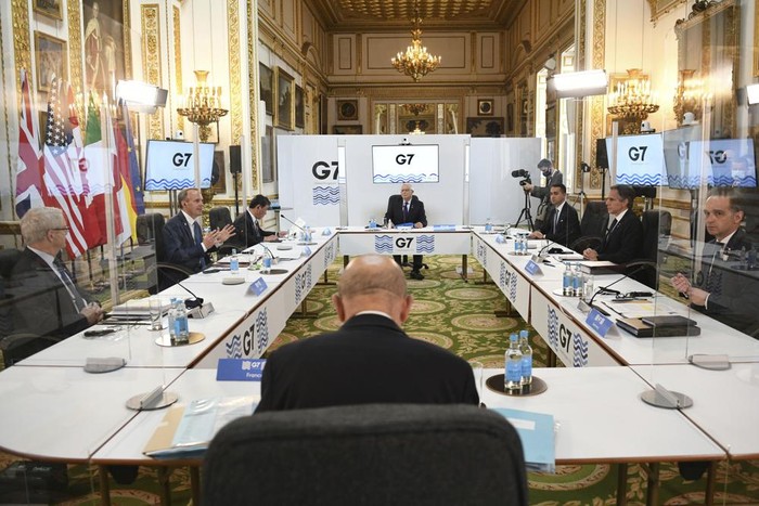 G7 foreign ministers are socially distanced as they meet in London, with clockwise from left, Canadian Minister of Foreign Affairs Marc Garneau, Britains Foreign Secretary Dominic Raab, Japanese Minister of Foreign Affairs Motegi Toshimitsu, European High Representative of the Union for Foreign Affairs Josep Borrell, Italian Minister of Foreign Affairs Luigi Di Maio, U.S. Secretary of State Antony Blinken, German Federal Minister for Foreign Affairs Heiko Maas and French Minister of Europe and Foreign Affairs Jean-Yves Le Drian, during talks at the G7 Foreign and Development Ministers meeting Tuesday May 4, 2021. (Stefan Rousseau/Pool via AP)