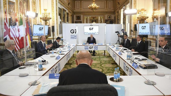 G7 foreign ministers are socially distanced as they meet in London, with clockwise from left, Canadian Minister of Foreign Affairs Marc Garneau, Britains Foreign Secretary Dominic Raab, Japanese Minister of Foreign Affairs Motegi Toshimitsu, European High Representative of the Union for Foreign Affairs Josep Borrell, Italian Minister of Foreign Affairs Luigi Di Maio, U.S. Secretary of State Antony Blinken, German Federal Minister for Foreign Affairs Heiko Maas and French Minister of Europe and Foreign Affairs Jean-Yves Le Drian, during talks at the G7 Foreign and Development Ministers meeting Tuesday May 4, 2021. (Stefan Rousseau/Pool via AP)