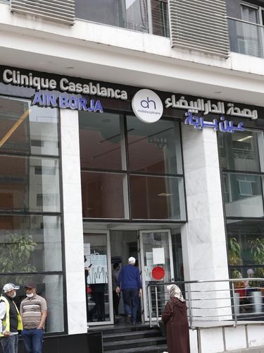 A Moroccan nurse takes care of one of the nine babies protected in an incubator at the maternity ward of the private clinic of Ain Borja in Casablanca, Morocco, Wednesday, May 5, 2021. A Malian woman gave birth to nine babies after n ' to have waited only seven, announced Wednesday the Ministry of Health of Mali. . Halima CissÈ, 25, gave birth by caesarean section Tuesday in Morocco after being sent there for special care, the ministry said. (AP Photo / Abdeljalil Bounhar)