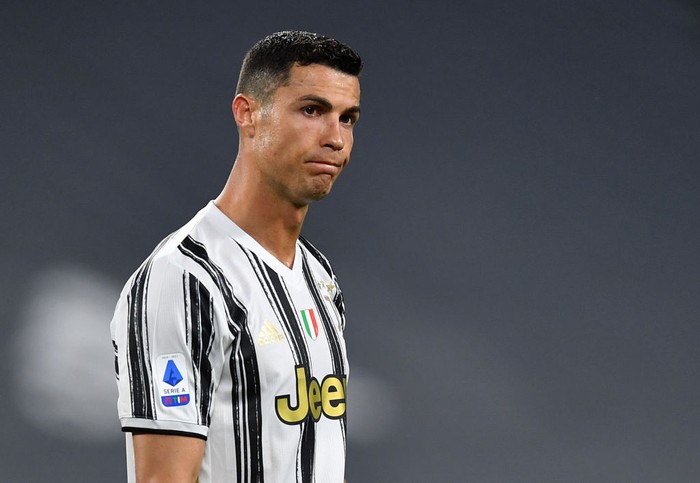 TURIN, ITALY - MAY 09: Cristiano Ronaldo of Juventus looks dejected during the Serie A match between Juventus  and AC Milan at  on May 09, 2021 in Turin, Italy. Sporting stadiums around Italy remain under strict restrictions due to the Coronavirus Pandemic as Government social distancing laws prohibit fans inside venues resulting in games being played behind closed doors. (Photo by Valerio Pennicino/Getty Images)