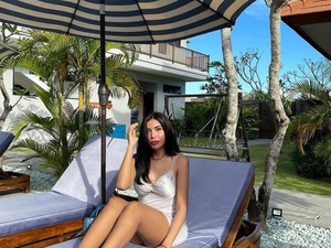 Gaya Millen Cyrus Pamer Foto Bareng Nakes di Wisma Atlet Tuai Kontroversi