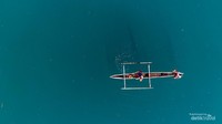 Nelayan sedang menjaring ikan di Togean.