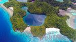 Menikmati Keindahan Pulau Togean dari Udara