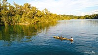 Nelayan sedang menjaring ikan. Kepulauan Togean di Sulteng bak surga yang tersembunyi. Liburan ke Togean, traveler bisa menikmati keindahan alam bawah laut dan wisata bahari.