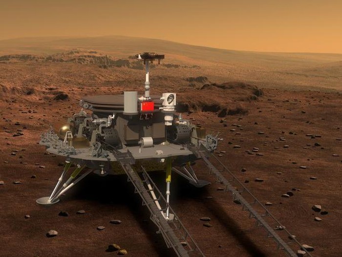 A visitor to an exhibition on Chinas space program looks at a life size model of the Chinese Mars rover Zhurong, named after the Chinese god of fire, at the National Museum in Beijing on Thursday, May 6, 2021. China has landed a spacecraft on Mars for the first time in the latest advance for its space program. The official Xinhua News Agency said Saturday, May 15, that the lander had touched down, citing the China National Space Administration. Chinese characters read: Build a Space Power. (AP Photo/Ng Han Guan)
