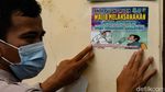 Aksi Superman Keliling Kampung Ingatkan Pemudik Tes Antigen