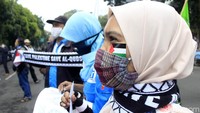 Aksi ini untuk mendukung Palestina yang sedang digempur Israel sejak sepekan yang lalu.