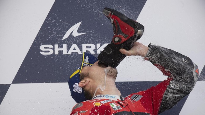 LE MANS, FRANCE - MAY 16: Jack Miller of Australia and Ducati Lenovo Team celebrates the victory on the podium and drinks champagne from a boot at the end of the MotoGP race during the MotoGP of France - Race at  on May 16, 2021 in Le Mans, France. (Photo by Mirco Lazzari gp/Getty Images)