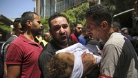 Hingga kini total sebanyak 212 warga Palestina tewas akibat serangan selama sepekan. AP Photo/Abdel Kareem Hana.