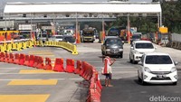 Untuk saat ini, gate tol masih menggunakan yang lama.