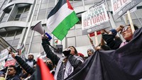 Aksi solidaritas untuk mendukung Palestina juga digelar di London. AP Photo/Alberto Pezzali.