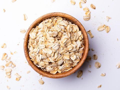 Oatmeal in a wooden bowl