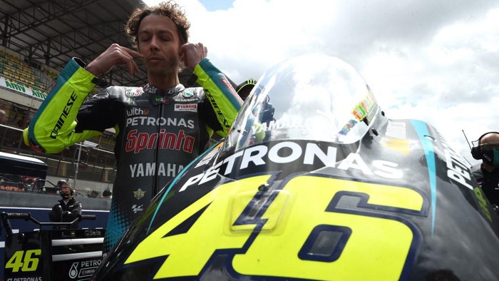 Petronas Yamaha SRTs Italian rider Valentino Rossi  waits on the grid, prior the French MotoGP, on May 16, 2021, in Le Mans, northwestern France. -  (Photo by JEAN-FRANCOIS MONIER / AFP)