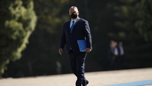 Hungary's Prime Minister Viktor Orban arrives for an EU summit at the Crystal Palace in Porto, Portugal, Saturday, May 8, 2021. On Saturday, EU leaders hold an online summit with India's Prime Minister Narendra Modi, covering trade, climate change and help with India's COVID-19 surge. (AP Photo/Francisco Seco, Pool)