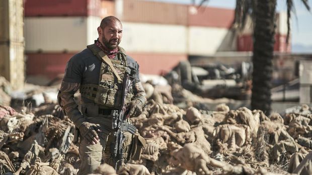 ARMY OF THE DEAD - (L-R) NORA ARNEZEDER as LILLY and DAVE BAUTISTA as SCOTT WARD. Cr: NETFLIX © 2021
