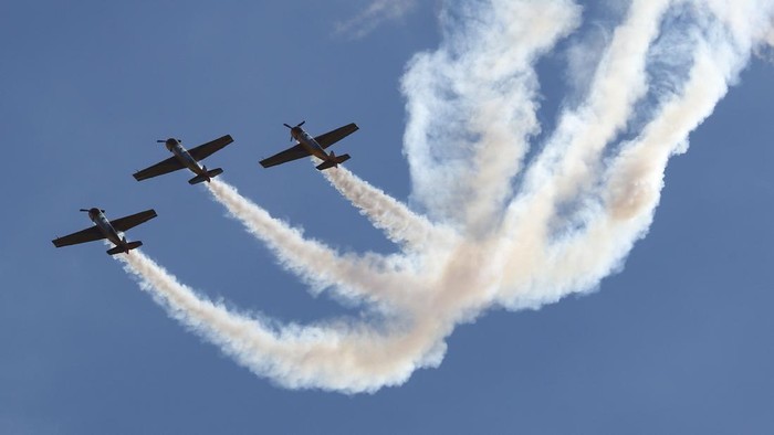Planes perform during the Sky, Theory and Practice festival at airfield 
