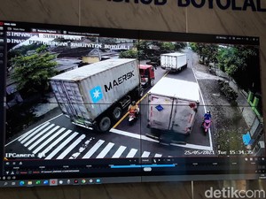 Terekam CCTV Pemotor Emak-emak Nyaris Terhimpit Truk