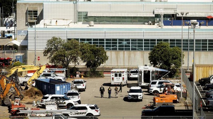 Law enforcement officers respond to the scene of a shooting at a Santa Clara Valley Transportation Authority (VTA) facility on Wednesday, May 26, 2021, in San Jose, Calif. Santa Clara County sheriffs spokesman said the rail yard shooting left multiple people, including the shooter, dead. (AP Photo/Noah Berger)