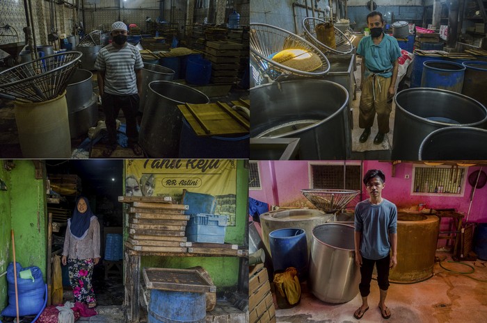 Duh, Perajin Tahu Cibuntu di Bandung Mogok Produksi Pekerja merapikan alat produksi saat aksi mogok pabrik pembuatan tahu di Sentra Industri Perajin Tahu Cibuntu, Bandung, Jawa Barat, Jumat (28/5/2021). Seluruh Industri Perajin Tahu di kawasan tersebut melakukan aksi mogok produksi mulai dari 28 mei hingga 30 mei akibat tingginya harga bahan baku kedelai yang mencapai Rp11 ribu sehingga mengganggu biaya produksi dan harga penjualan tahu ke masyarakat. ANTARA FOTO/Novrian Arbi