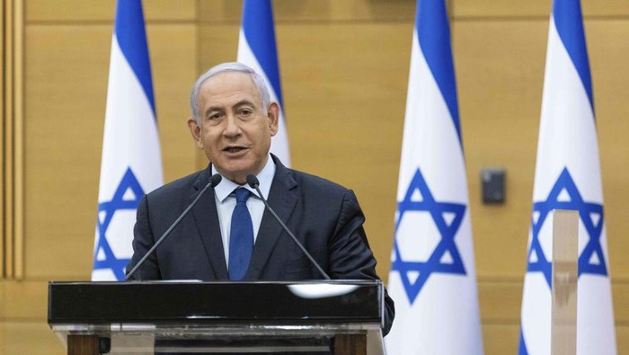 Israeli Prime Minister Benjamin Netanyahu speaks to the Israeli Parliament in Jerusalem, Sunday, May 30, 2021. (Yonatan Sindel/Pool via AP)