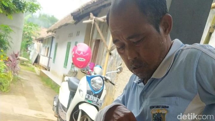 Romli Suganda (53), loper koran asal Pandeglang