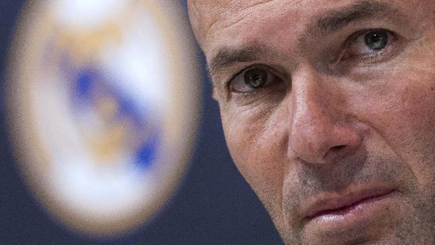 FILE - in this Thursday, May 31, 2018 file photo Zinedine Zidane listens to the questions of journalists during a press conference in Madrid, Spain. Zinedine Zidane is again stepping down as Real Madrid coach. The club says the Frenchman is leaving his job. It comes four days after a season in which Madrid failed to win a title for the first time in more than a decade. (AP Photo/Borja B. Hojas, File)