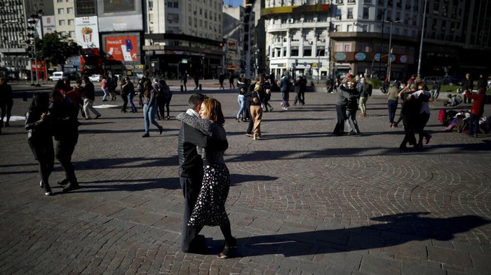 A couple dances a tango during a demonstration demanding they be allowed to practice in open spaces amidst ongoing restrictions due to surging new coronavirus caseloads, in Buenos Aires, Argentina, Saturday, May 29, 2021. Since the pandemic hit the country, tango, an essential part of Argentine culture, has been suspended to try to stop the wave of COVID-19 infections. (AP Photo/Natacha Pisarenko)