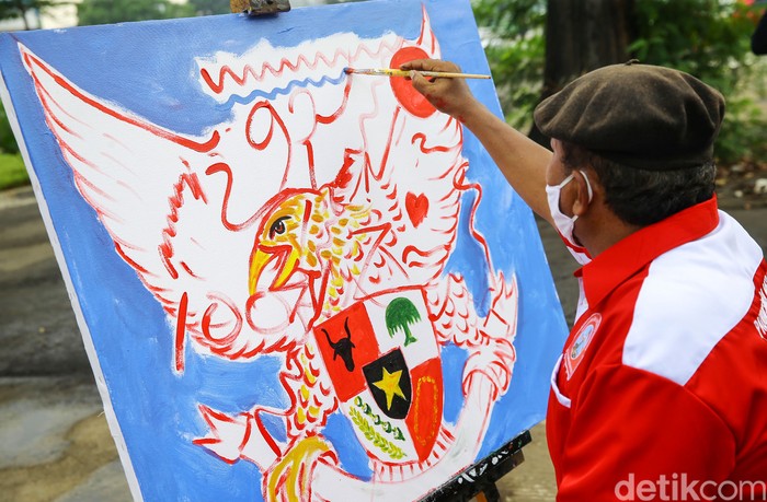 Sejumlah anak jalanan bersama Gerakan Cinta Pancasila menggelar acara untuk memperingati hari lahirnya Pancasila, Jakarta, Selasa (1/6/2021). Kegiatan untuk memperingati hari lahirnya Pancasila tersebut diisi dengan kegiatan menyanyi, membaca puisi serta melukis.