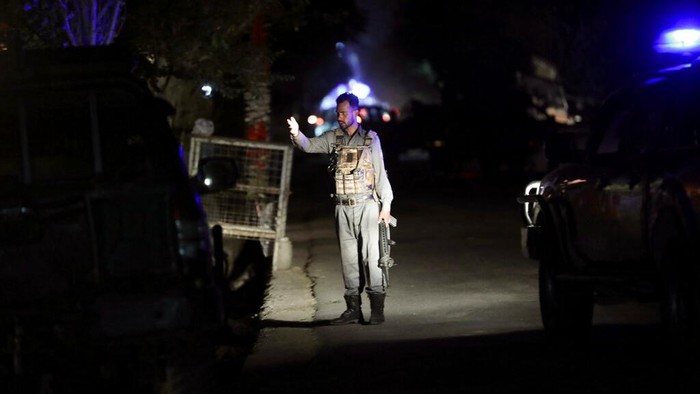 Afghan security personnel inspect the site of a bomb explosion in Kabul, Afghanistan, Tuesday, June 1, 2021. An Afghan government spokesman says two bombs exploded in quick succession in separate locations of a neighborhood in west Kabul, leaving multiple people dead and wounded. (AP Photo/Rahmat Gul)