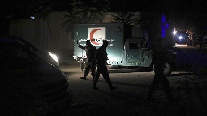 Afghan security personnel inspect the site of a bomb explosion in Kabul, Afghanistan, Tuesday, June 1, 2021. An Afghan government spokesman says two bombs exploded in quick succession in separate locations of a neighborhood in west Kabul, leaving multiple people dead and wounded. (AP Photo/Rahmat Gul)