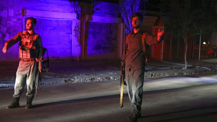 Afghan security personnel inspect the site of a bomb explosion in Kabul, Afghanistan, Tuesday, June 1, 2021. An Afghan government spokesman says two bombs exploded in quick succession in separate locations of a neighborhood in west Kabul, leaving multiple people dead and wounded. (AP Photo/Rahmat Gul)
