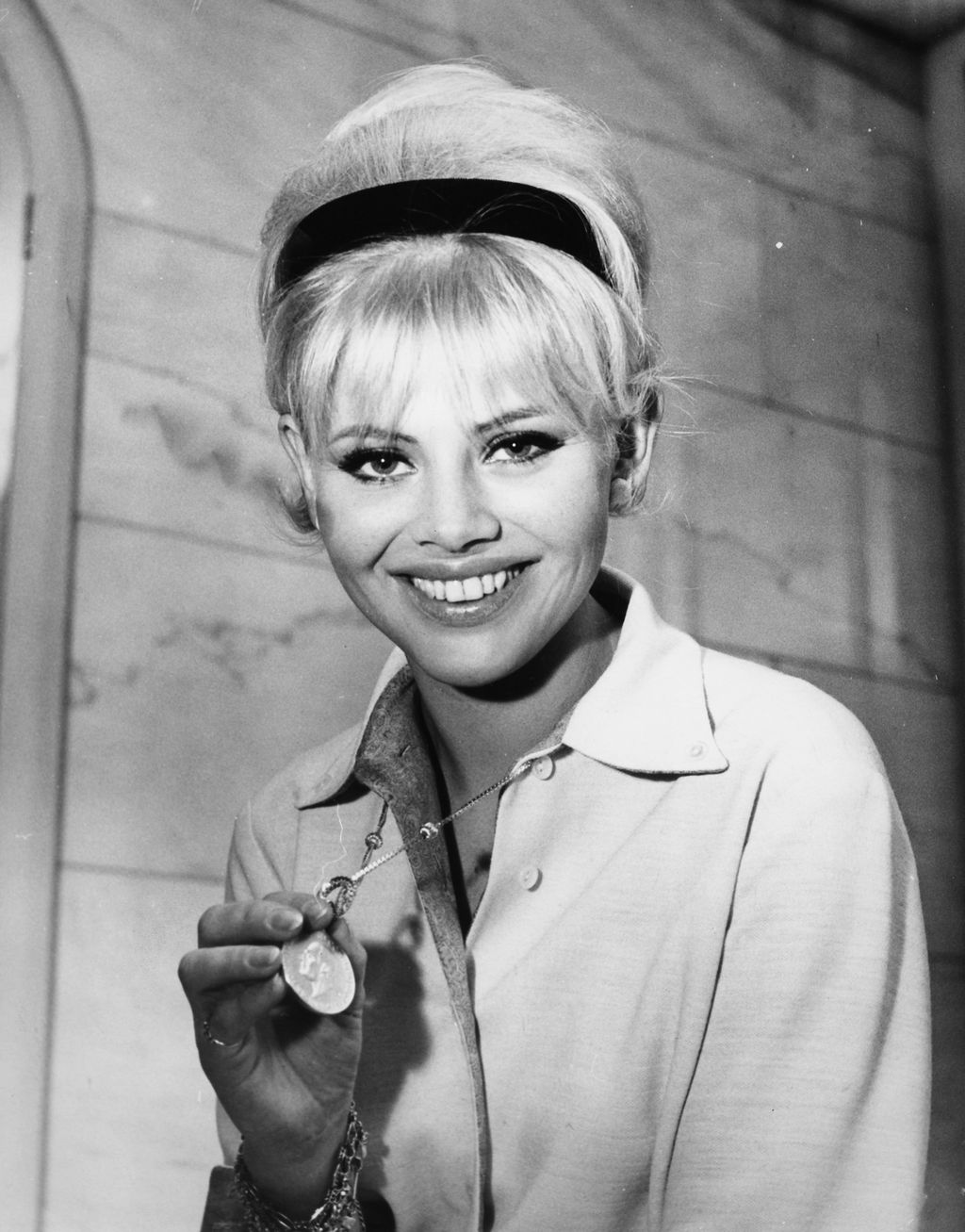 Portrait of actress Britt Ekland, soon to star in the film 'Those Magnificent Men and their Flying Machines', at a press conference at the Savoy Hotel, London, January 27th 1964. (Photo by Dennis Oulds/Central Press/Getty Images)