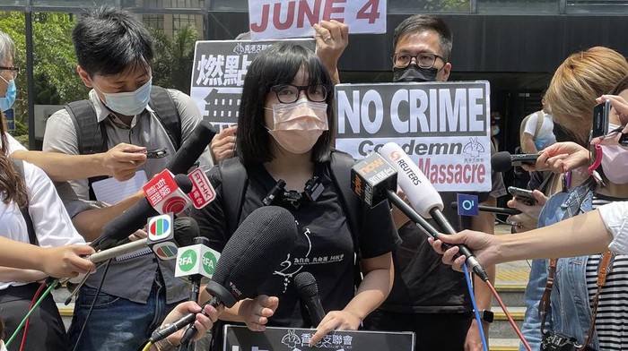 FILE - In this May 6, 2021, file photo, Chow Hang Tung, the vice chair of The Hong Kong Alliance in Support of Patriotic Democratic Movements of China, speaks to media outside a court in Hong Kong. Hong Kong police on Friday, June 4, arrested the committee member that organizes the city’s annual June 4 museum and candlelight vigil, on the 32nd anniversary of a bloody military crackdown on pro-democracy protesters in Beijing’s Tiananmen Square, according to local media reports. (AP Photo/Rafael Wober, File)