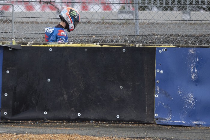 LE MANS, FRANCE - MAY 16:  Alex Rins of Spain and Team Suzuki ECSTAR  walks in service road after crashing out during the MotoGP race during the MotoGP of France - Race at  on May 16, 2021 in Le Mans, France. (Photo by Mirco Lazzari gp/Getty Images)