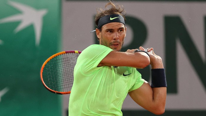 PARIS, FRANCE - JUNE 03:  Rafael Nadal of Spain plays a backhand  during his mens second round match against Richard Gasquet of France during day five of the 2021 French Open at Roland Garros on June 03, 2021 in Paris, France. (Photo by Clive Brunskill/Getty Images)