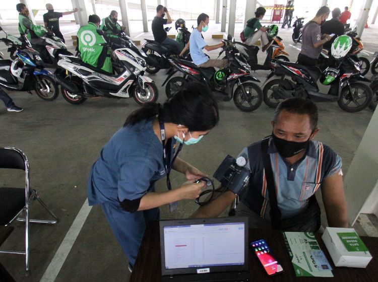 Ratusan Driver Ojol Divaksin COVID-19