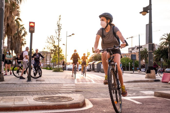 Valencia, Spain; 6th May 2020: People walking and playing sports during the coronavirus pandemic in the time slot allocated by the Government. Walking and individual sport activities are allowed with some limitations and respecting social distancing measures
