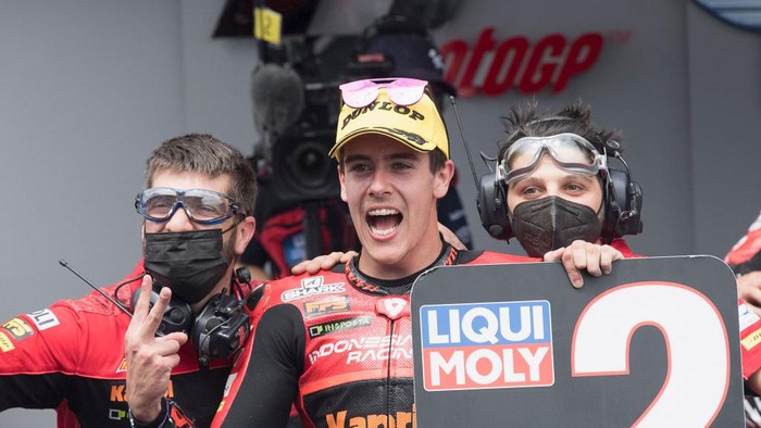 BARCELONA, SPAIN - JUNE 06:  Jeremy Alcoba of Spain and Indonesian Racing Gresini Moto3 celebrates the second place under the podium during the Moto3 race during the MotoGP of Catalunya - Race at Circuit de Barcelona-Catalunya on June 06, 2021 in Barcelona, Spain. (Photo by Mirco Lazzari gp/Getty Images)