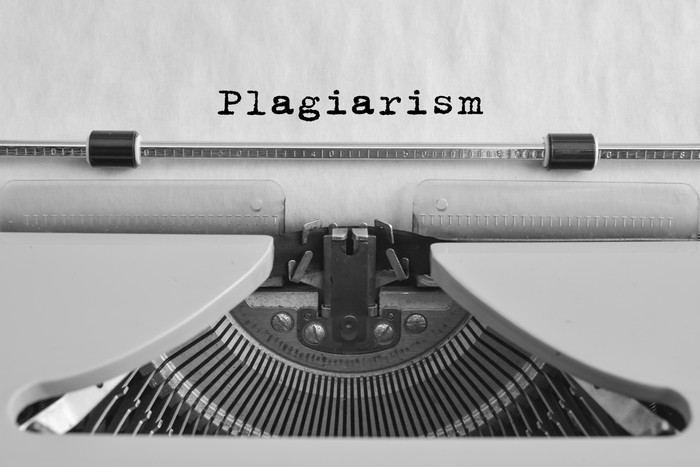 Plagiarism typed on an old typewriter. vintage thing. Copyright. Close-up