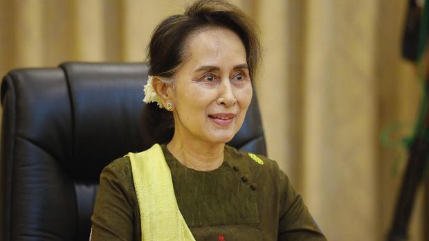 In this handout image provided by the Myanmar State Counsellor Office, Myanmar leader Aung San Suu Kyi is shown while she attends a video conference, Friday, July 3, 2020, in Naypyitaw, Myanmar. Suu Kyi expressed sadness Friday over a landslide at a jade mining site in the country's north that took over 100 lives, blaming the tragedy on joblessness. (Myanmar State Counsellor Office via AP)