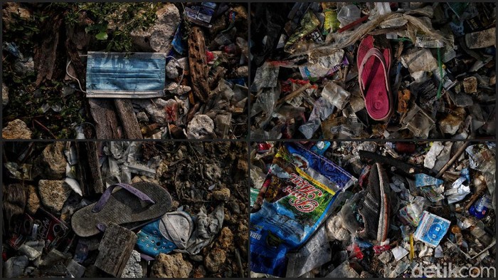 Pekerja Dinas Lingkungan Hidup membersihkan Pantai Cilincing di Jakarta, Selasa (8/6/2021). Pada 8 Juni diperingati sebagai Hari Laut Sedunia, peringatan ini dilakukan sebagai bentuk perhatian akan pentingnya ekosistem laut yang selama ini menjadi sumber daya yang dibutuhkan manusia.
