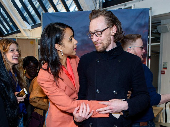 LONDON, ENGLAND - APRIL 07:   (L-R) Charlie Cox, Zawe Ashton and Tom Hiddleston present the Best Actress award on stage during The Olivier Awards 2019 with Mastercard at the Royal Albert Hall on April 07, 2019 in London, England. (Photo by Jeff Spicer/Getty Images)