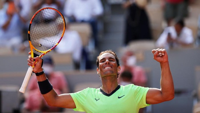 PARIS, FRANCE - JUNE 09: Rafael Nadal of Spain celebrates match point and victory in his Mens Singles Quarter-Final match against Diego Schwartzman of Argentina during Day Eleven of the 2021 French Open at Roland Garros on June 09, 2021 in Paris, France. (Photo by Clive Brunskill/Getty Images)
