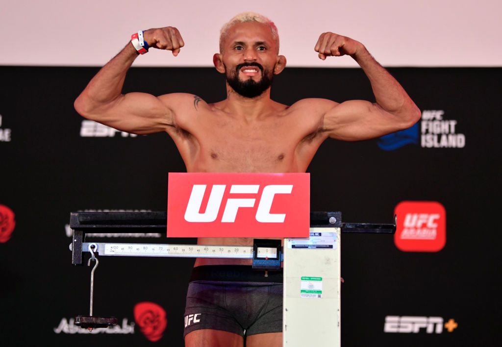 ABU DHABI, UNITED ARAB EMIRATES - JULY 19: In this handout image provided by UFC, Deiveson Figueiredo of Brazil celebrates after defeating Joseph Benavidez in their UFC flyweight championship bout during the UFC Fight Night event inside Flash Forum on UFC Fight Island on July 19, 2020 in Yas Island, Abu Dhabi, United Arab Emirates. (Photo by Jeff Bottari/Zuffa LLC via Getty Images)