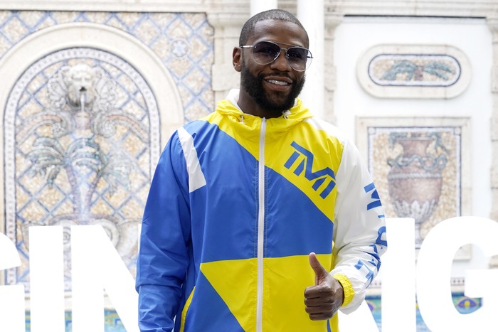 Floyd Mayweather poses for a photograph during a press event, Thursday, June 3, 2021, in Miami Beach, Fla. Mayweather will fight Logan Paul in an exhibition boxing match at the Hard Rock Stadium in Miami Gardens, Fla. Sunday. (AP Photo/Lynne Sladky)