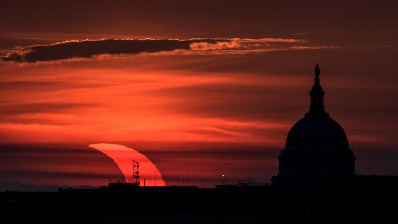 GRAND CANYON NATIONAL PARK, AZ - MAY 20:  A composite of images of the first annular eclipse seen in the U.S. since 1994 shows several stages, left to right, as the eclipse passes through annularity and the sun changes color as it approaches sunset on May 20, 2012 in Grand Canyon National Park, Arizona. Differing from a total solar eclipse, the moon in an annular eclipse appears too small to cover the sun completely, leaving a ring of fire effect around the moon. The eclipse is casting a shallow path crossing the West from west Texas to Oregon then arcing across the northern Pacific Ocean to Tokyo, Japan. (Photo by David McNew/Getty Images)