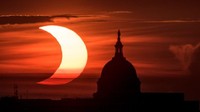 GRAND CANYON NATIONAL PARK, AZ - MAY 20:  A composite of images of the first annular eclipse seen in the U.S. since 1994 shows several stages, left to right, as the eclipse passes through annularity and the sun changes color as it approaches sunset on May 20, 2012 in Grand Canyon National Park, Arizona. Differing from a total solar eclipse, the moon in an annular eclipse appears too small to cover the sun completely, leaving a ring of fire effect around the moon. The eclipse is casting a shallow path crossing the West from west Texas to Oregon then arcing across the northern Pacific Ocean to Tokyo, Japan. (Photo by David McNew/Getty Images)